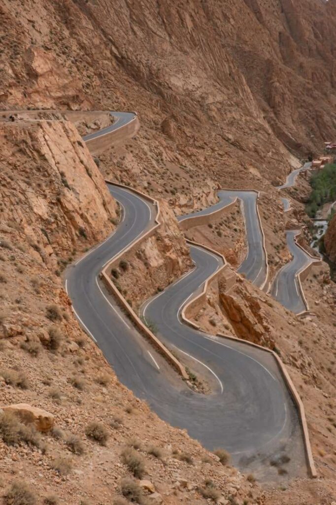 Winding road in narrow valley 