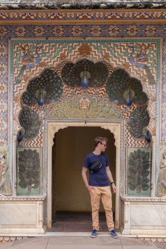 matthias stading in front of the peacock gate at the pritam niwas chowk courtyard in the city palace in jaipur