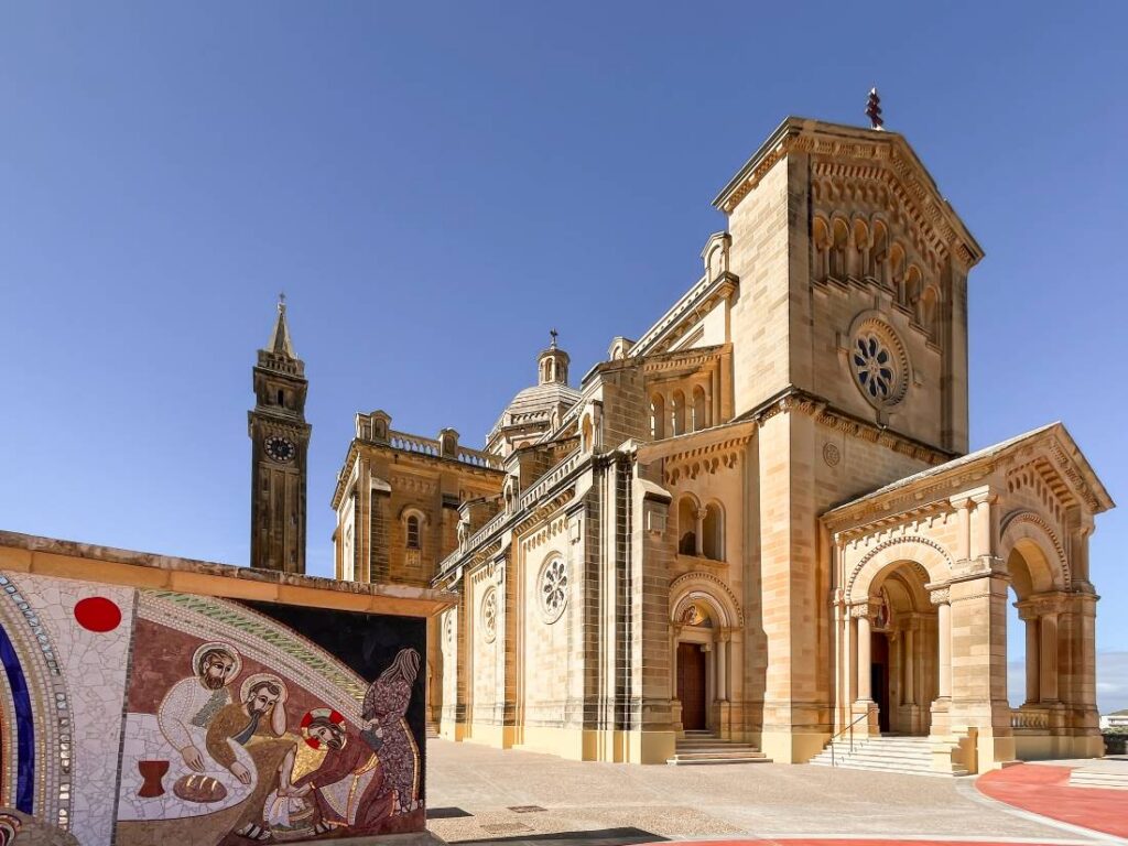 Ta'Pinu church with stunning architecture and mosaics in front